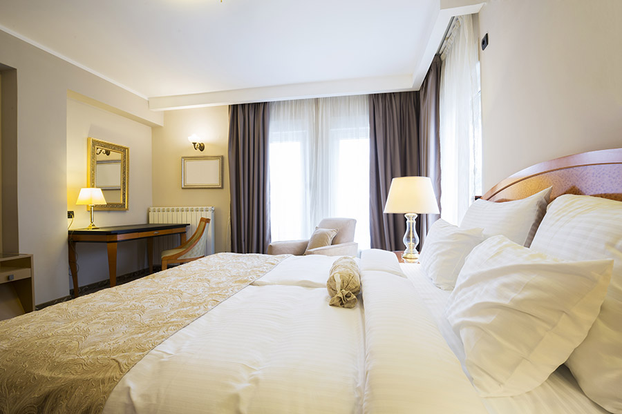 Classic style hotel bedroom interior
